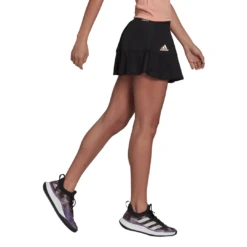 Adidas Women's Tennis Primeblue Aeroknit Match Skirt (Black) 11 Adidas Women's Tennis Primeblue Aeroknit Match Skirt (Black) -Tennipro Store H31425 APP on model walking white
